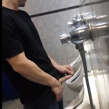 He stretches the foreskin after peeing at urinal | Daily Dudes @ Dude Dump