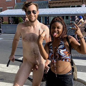 Men riding bike totally naked during WNBR | Daily Dudes @ Dude Dump
